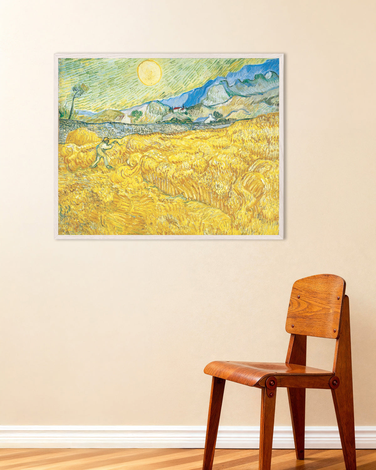 Plakat „Pole pszenicy za szpitalem Saint-Paul z żniwiarzem (1889), Vincent van Gogh” w białej drewnianej ramie